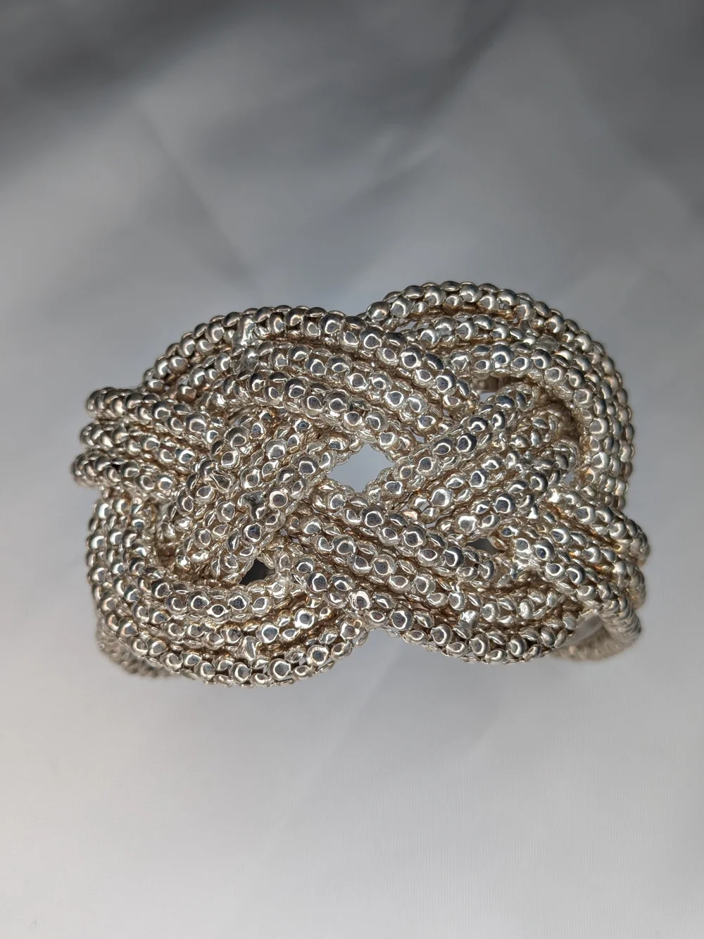 Silver Tone Woven Knot Flexible Cuff Bracelet Textured Caviar Bead Statement